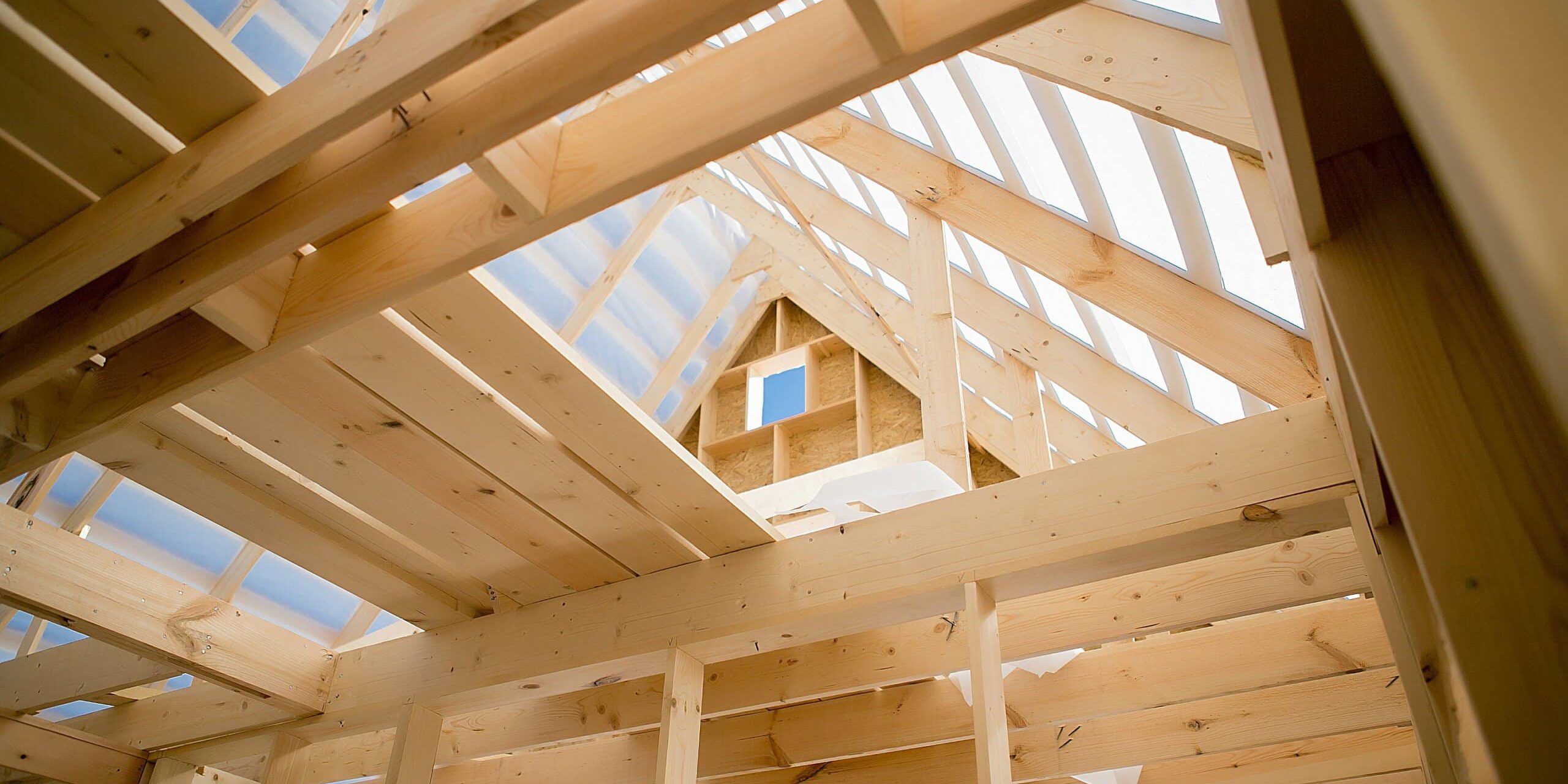 Wooden house roof under construction
